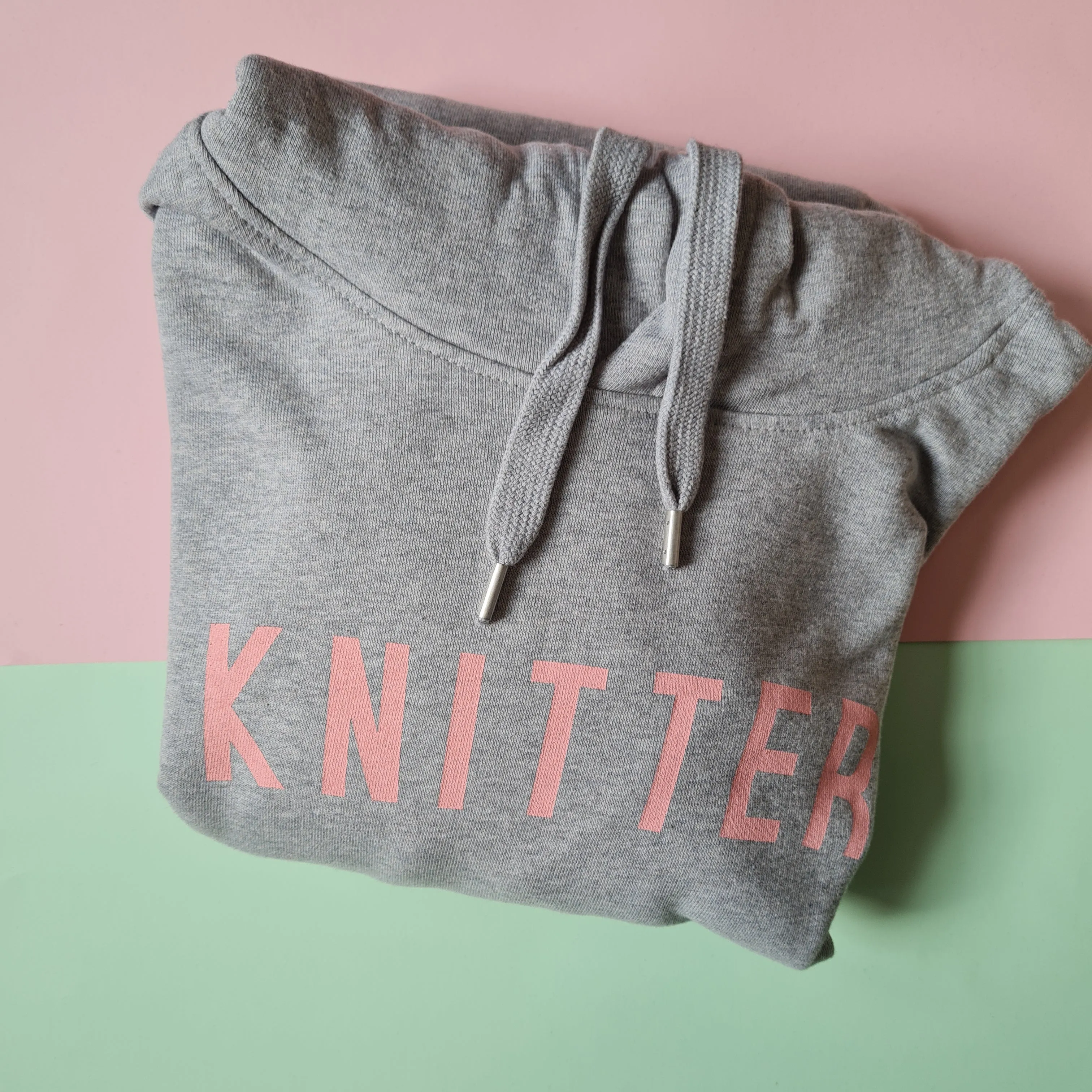 KNITTER Hoodie - 100% Organic Fairtrade Cotton - Pastel Font